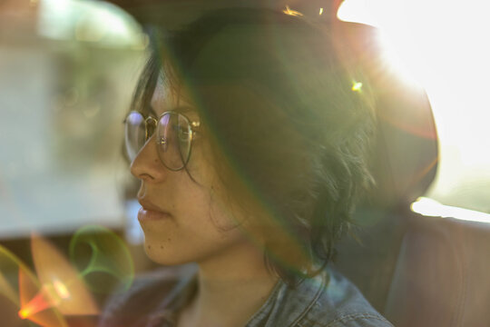 Portrait of a beautiful woman in car traveling