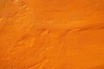 Orange Paint Color on Stucco Wall Texture for Background.