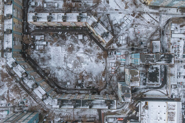 Obraz premium Snow-covered winter city from above. Beautiful winter photography