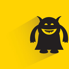 cute monster with shadow on yellow background