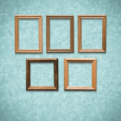 Fototapeta premium frames on old blue wall