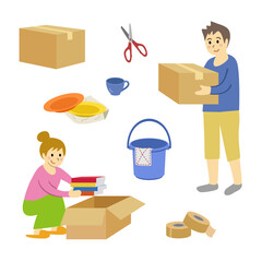 引っ越しの荷造りをするカップル