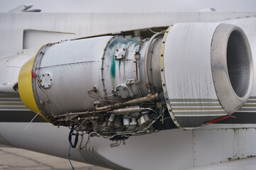 Open engine of the airplane.