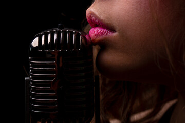 Karaoke. Closeup lip with vintage microphone. Sensual woman singer. Concert singing.