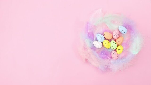Blinking lights in nest of feathers with Easter eggs. Stop motion