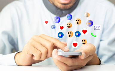 Young man using smartphone with social media  application network during stay at home, connection, communication and work from home concept	
