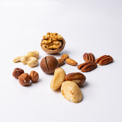 Assorted nuts without shells isolated on a white background