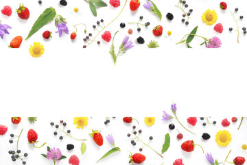 Frame from flowers and berries with place for text, top view. The concept of summer, spring, Mother's Day, March 8. 