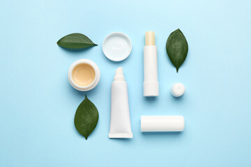 Natural lip balms on color background