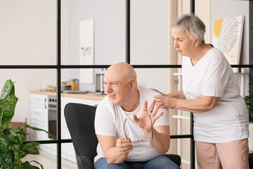 Stressed senior man at home