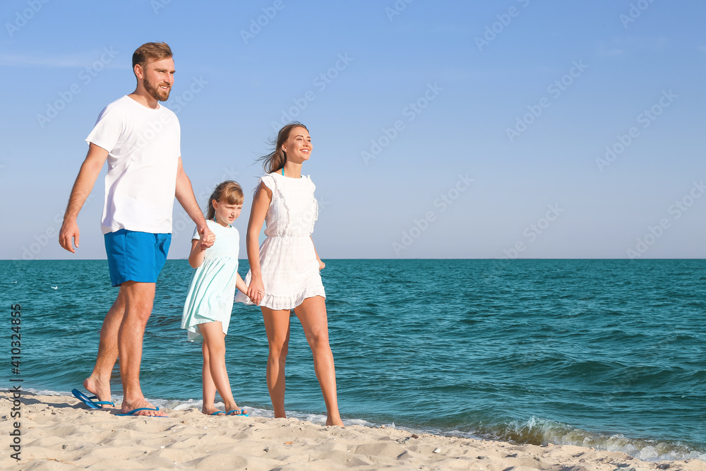 Sticker happy family walking on sea beach