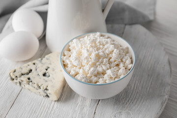 Different dairy products on light background