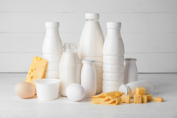 Different dairy products on light background