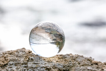 Crystal ball of fortune teller outdoors near river