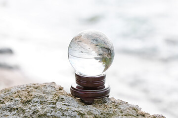 Crystal ball of fortune teller outdoors near river