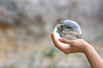 Fortune teller with crystal ball outdoors