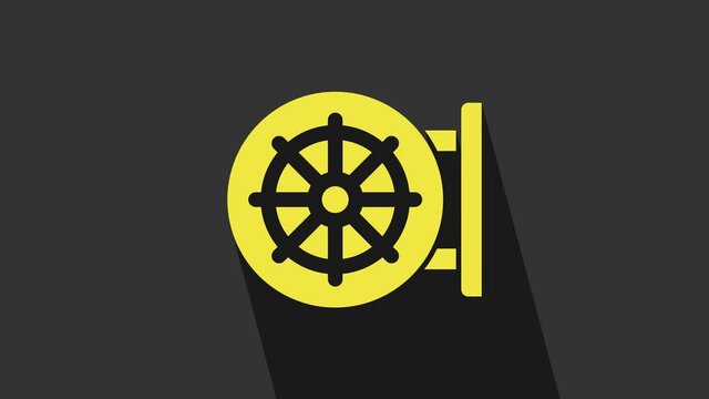 Yellow Dharma wheel icon isolated on grey background. Buddhism religion sign. Dharmachakra symbol. 4K Video motion graphic animation