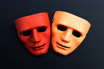 Face masks on dark background.