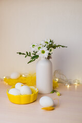 Congratulatory easter background. Easter eggs and flowers. Background with copy space. Selective focus.