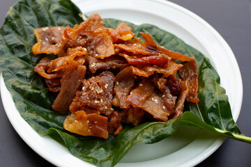 Sweet pork or pork Jerky on dark background.