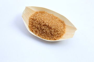 Brown sugar on white background.