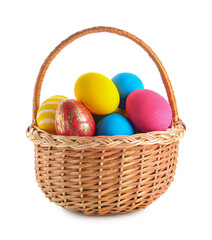 Basket with beautiful Easter eggs on white background