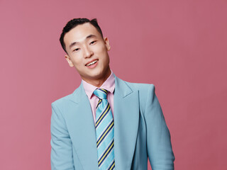 business man in blue suit asian appearance self confidence cropped view