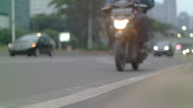Blurred street traffic, daytime traffic time-lapse