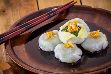 Candy Kuicheai,Garlic chives with soy source. Dim sum is chinese cuisine.
