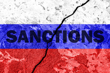 The flag of the Russian Federation on a cracked cement wall with the words 