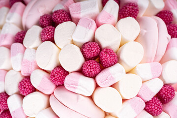 Dessert consisting of marshmallows and ripe raspberries, close-up. Sweet background. Selective focus. High quality photo