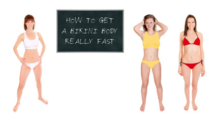 Three athletic slim women wearing bikinis in front of a chalkboard , how to get a bikini body really fast is written on the board, isolated on white studio background