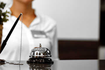 Hotel service bell on front desk counter