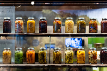 wall of glass mason jars of colorful pickled vegetables, taken at Canadian Food and Agriculture...