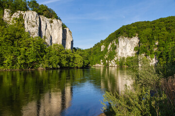 Fototapeta na wymiar Danube river breakthrough near Kelheim, Bavaria, Germany with limestone rock formations and clear water