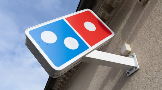 Dominos pizza sign and brand logo of restaurant Domino's pizza chain
