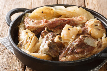 lamb and cabbage or known as farikal is Norway's national dish close-up in a pan on the table. Horizontal