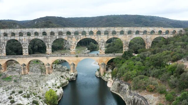 Flight over ancient Pont du Gard aqueduct in France