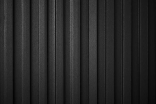 Striped Black wave steel metal sheet cargo container line industry wall texture pattern for background.