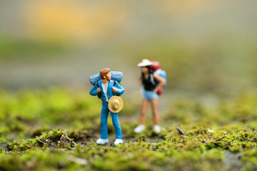 Miniature people : Backpacker Traveling as a team, using as travel adventure concept.