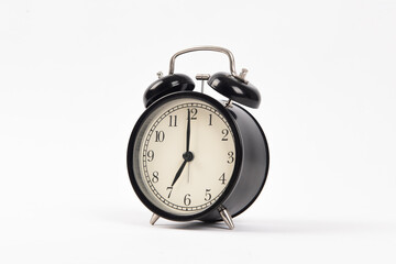 Black retro alarm clock isolated on white background