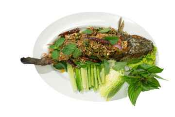 Larb plachon is fried snake-head fish topping with chili and spicy herbs. Served with vegetable,sticky rice. Spicy fried fish salad on white dish isolated on white background with path.