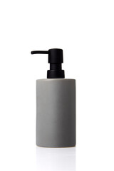 Cream spa bottle gray on white
