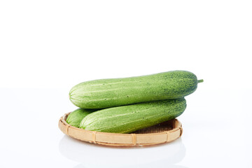 Fresh cucumber on white background