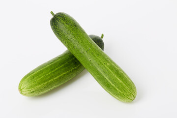 Fresh cucumber on white background