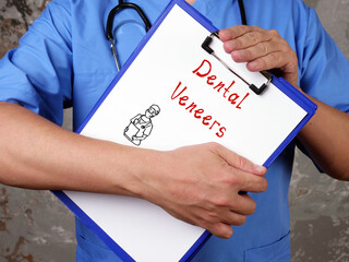  Dental Veneers inscription on the piece of paper.