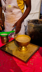 hands of a person preparing food