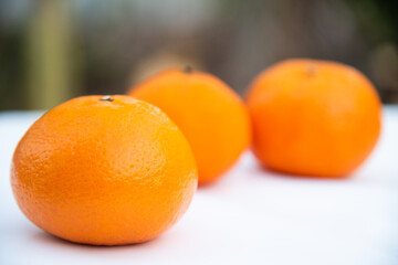 fresh orange fruit on blur background.