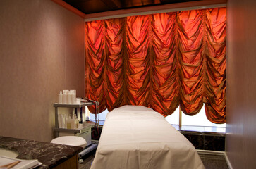 Exclusive massage treatment room or cabana inside spa or wellness thermal suite of modern luxury...