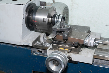 Fototapeta na wymiar Cutting an aluminum part with a cutter